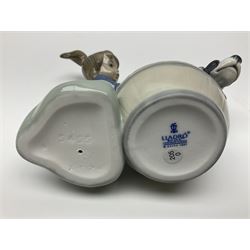 Pair of Lladro figures comprising 'Mis Amigos' model no 5456, and 'Bashful Bather' model no 5455, both with boxes