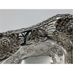 Edwardian silver swing handled basket, of navette form, with four repousse lion masks to each corner and with pierced and embossed floral, scroll and shell decoration to sides, base and handle, hallmarked Charles Horner, Birmingham 1906, height including handle H20cm