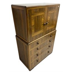 Early 20th century Art Deco walnut cocktail tallboy chest, fitted with double cupboard enclosing two shelves over two short and three long drawers, each with shell shaped handes