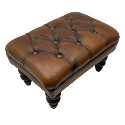 Laura Ashley - hardwood-framed armchair, traditional shape with arched cresting rail over rolled arms, upholstered in buttoned brown leather with studded work, on turned front feet (W76cm, W95cm, D84cm); together with matching rectangular footstool (53cm x 34cm, H29cm)