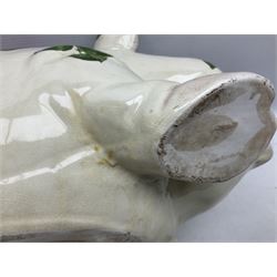 Large ceramic figure of a pig decorated with roses, L45cm