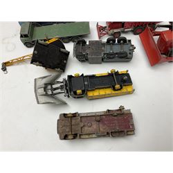 Dinky - twenty-six unboxed and playworn die-cast models including Foden Regent Tanker, two Foden lorries, Pressure Refueller No.642, Snow Plough, Elevator Loader, Foden Dump Truck, Blaw Knox Bulldozer and other commercial vehicles