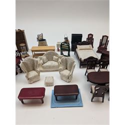 1:24 scale dolls house furniture, comprising stove, mangle, couch and arm chairs, bed, bathroom suite, two dining tables with chairs, side tables, cabinets, dressers, etc 
