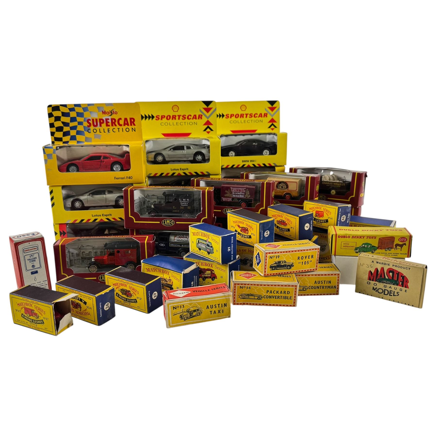 Collection of die cast model cars, trucks and trains, including Maisto Supercar Collection, Matchbox Models of Yesteryear, Matchbox Series, Dublo Dinky Toys and Cameo from Corgi The Village Collection, mostly boxed
