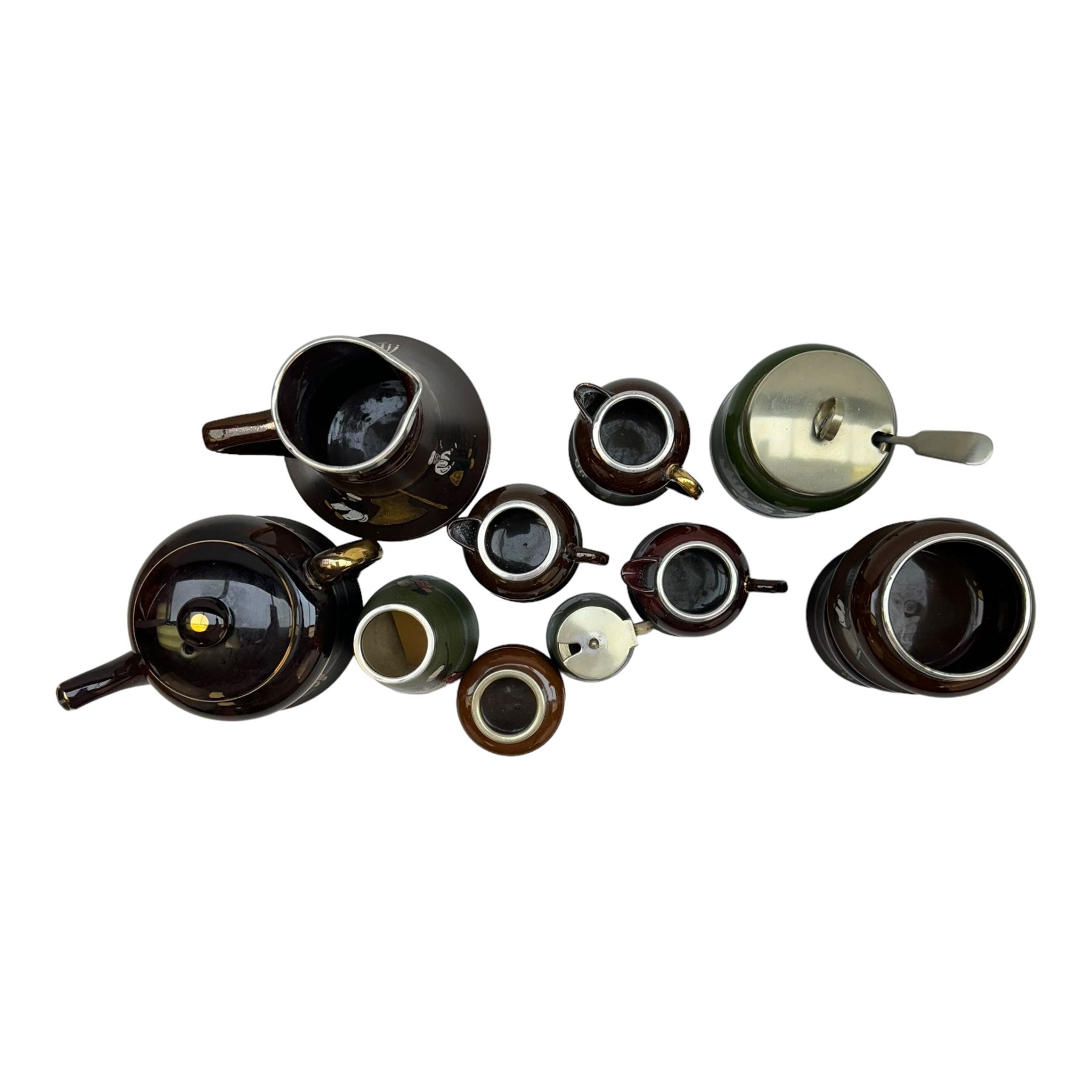 Taylor Tunnicliffe & Co silver mounted seven piece tea service, hallmarked Harold Bushell & Co Ltd, Birmingham 1908 (and other dates), together with a similar example and three silver plate mounted examples (11)