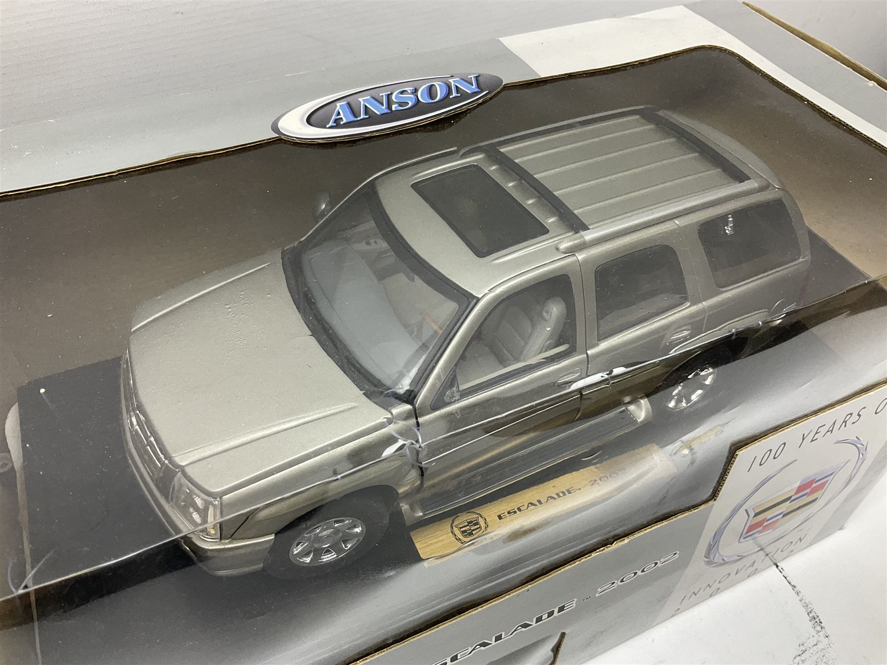 Five Anson 1:18 scale models - limited edition Cadillac Escalade 2002; Dodge Ram 3500; 1963 Ford Thunderbird; Saab 900 Turbo Cabriolet; and Ferrari Dino 246GT; all boxed (5)