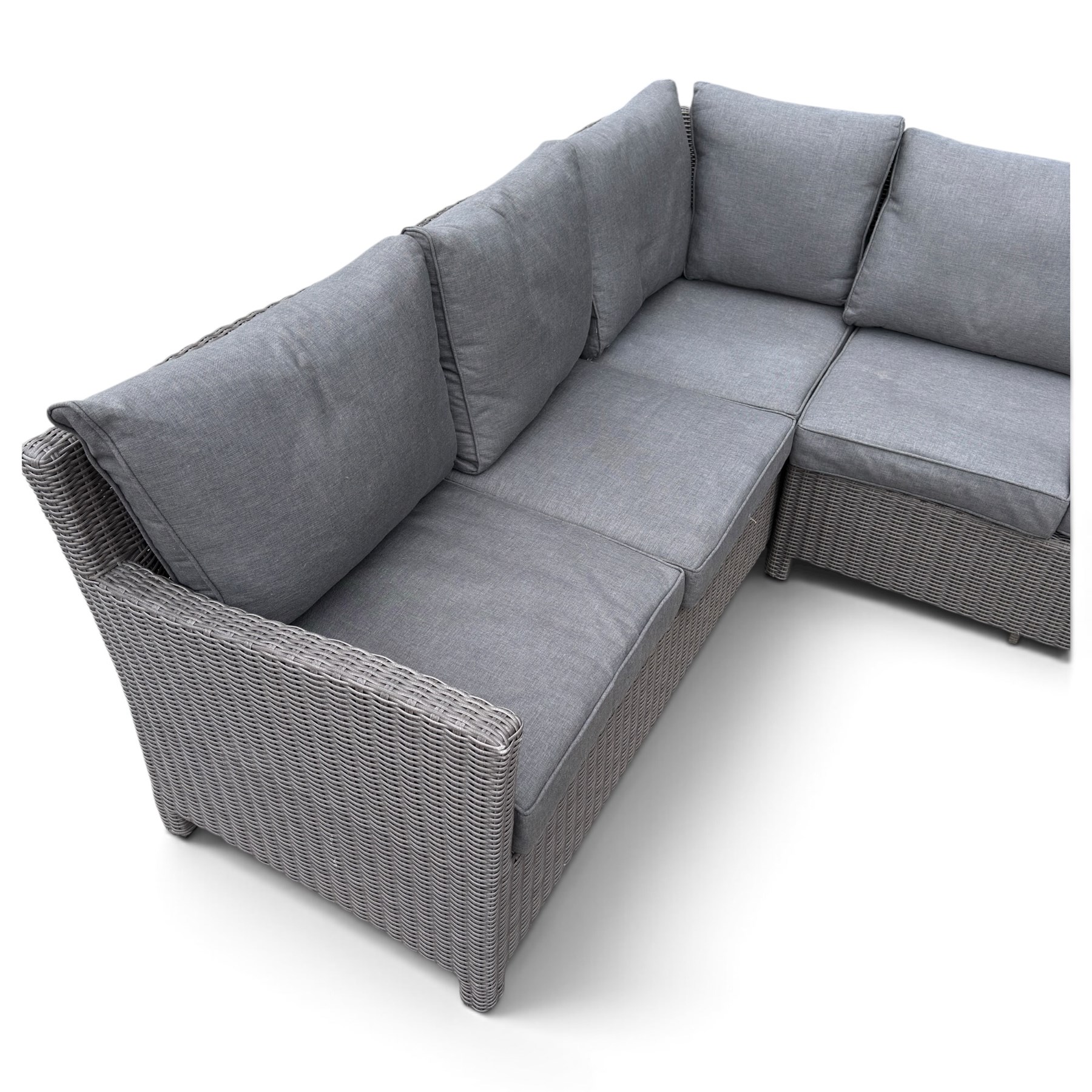 Kettler - Palma rattan garden lounge suite, comprising modular corner sofa (DIM) with slatted and rattan garden table on end supports (DIM), and three stools (DIM), with loose seat cushions