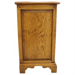 Small 20th century burr oak chest, the figured top over three graduated drawers with moulded fronts and pierced brass handles, on shaped feet