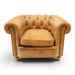 Alexander James - Chesterfield tan armchair, button backed with scrolled arms, brass studd...