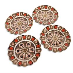 Four Royal Crown Derby Old Imari 1128 pattern fluted dessert plates, D21cm