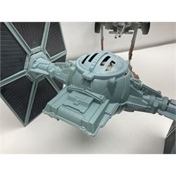 Star Wars - four space/land vehicles comprising Millenium Falcon with hinged top and figures; TIE Fighter; X-Wing Fighter with pilot; and AT-ST 'Chicken Walker' transporter; all unboxed (4)