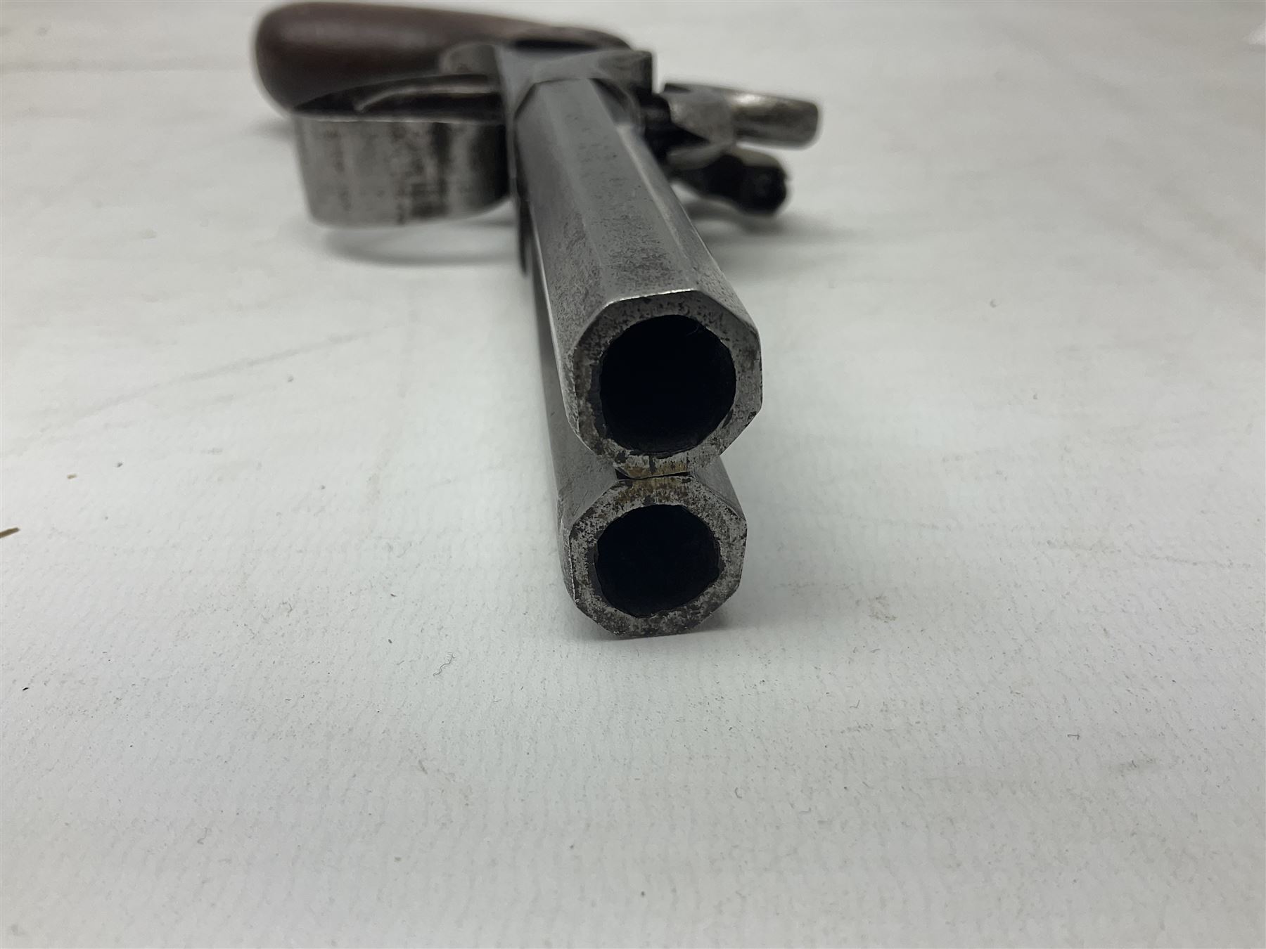 19th century Belgian double barrel side by side percussion pistol, approximately 40 calibre, with 8cm octagonal barrels, and wooden stock L22cm