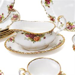 Royal Albert Old Country Roses tea and dinner ware comprising six dinner plates, five dessert bowls, sauce boat and stand, four breakfast cups and saucers, three tea cups and four saucers, six tea plates, milk jug, sugar bowl and bread and butter plate