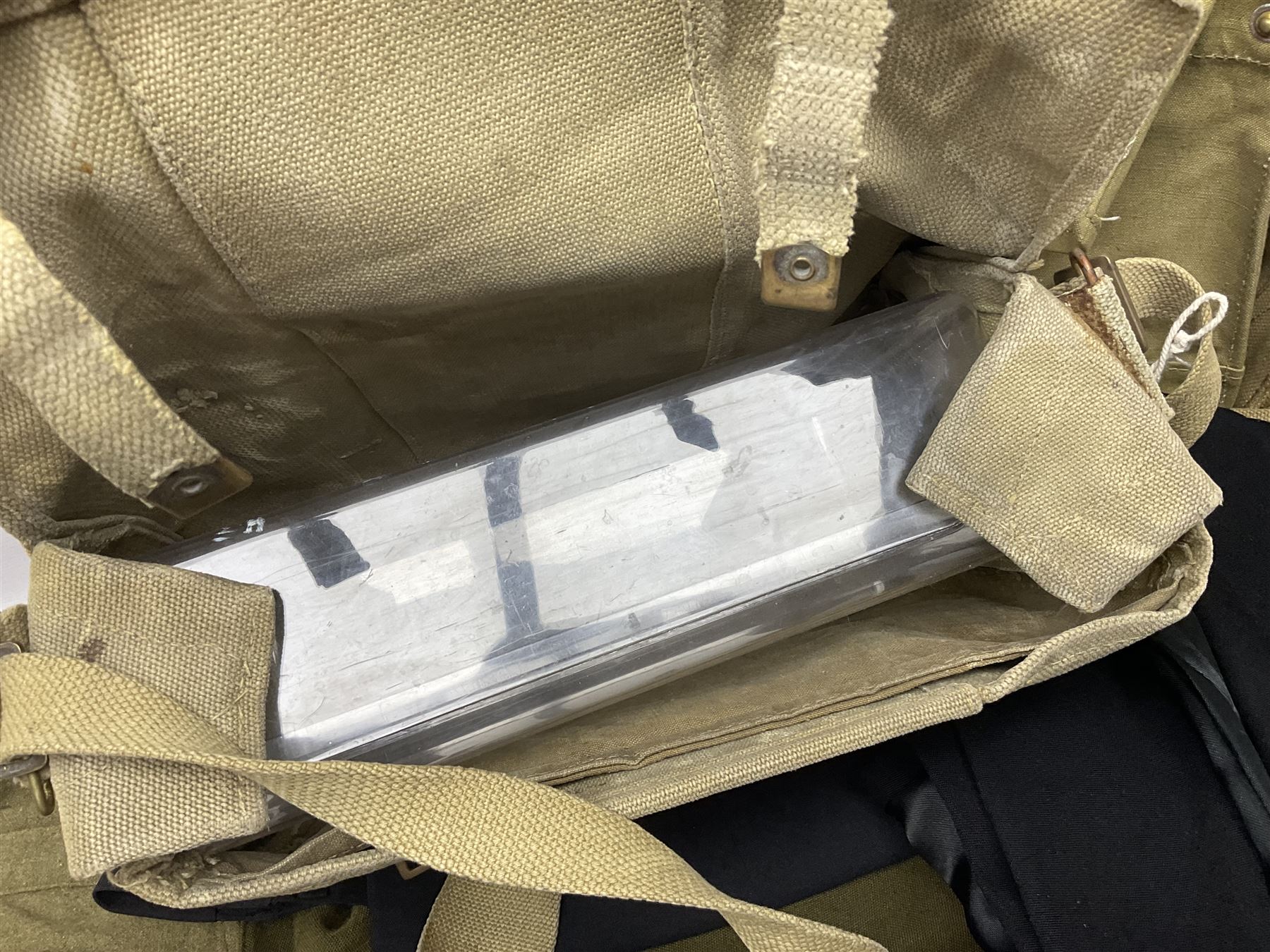 Two post-WWII British Army No.2 Dress tunics, one with Green Howards buttons; army shirt dated 1951; Royal Fleet Auxilliary jacket with trousers; three RAF/WAAF uniforms and RAF Greatcoat; and three canvas/webbing bags, two dated 1943 & 1945