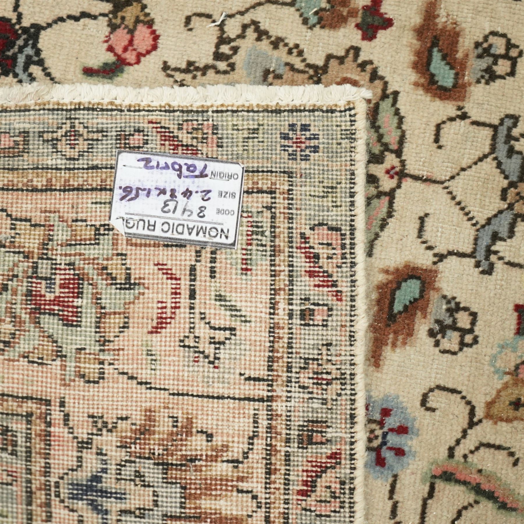 Persian Kashan rug, ivory ground field decorated with an all-over design of scrolling vines and stylized palmettes in pastel tones and conforming floral borders