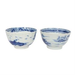 Two 19th century Chinese blue and white tea bowls, each decorated with traditional landscapes, together with two similar saucers, tea bowl H5cm, D9cm  
