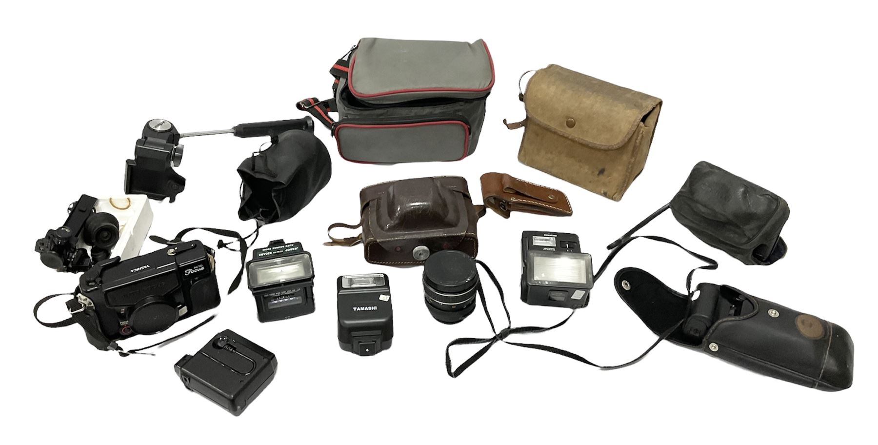 Quantity of cameras and accessories to include Olympus Trip 35, Minolta A f-EII 35mm, Yashica Auto Focus camera, Hanimex 35mm af camera in case, Kodak No.2A Folding Pocket Brownie camera in case, Minolta VLT-501 lens, etc