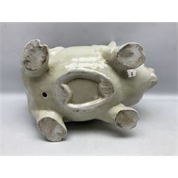 Large ceramic figure of a pig decorated with roses, L45cm