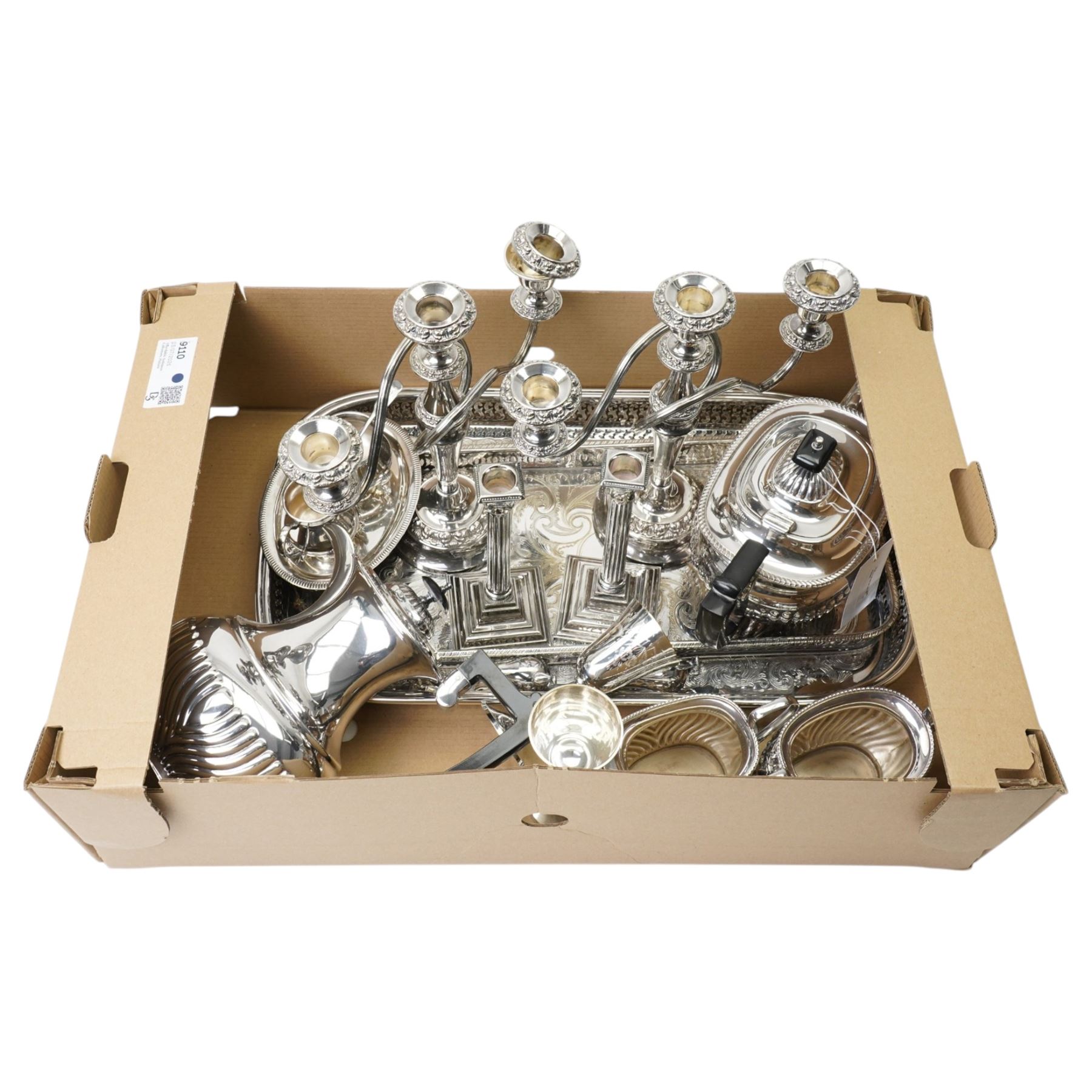 Silver plated items including four piece tea set, pair of candelabra, pair of candlesticks, sugar bowl and cream jug with silver spoon etc