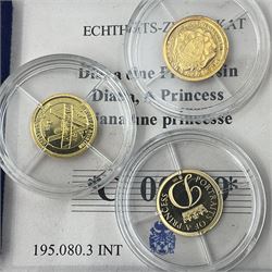 Nine miniature gold coins including 2017 ‘British Landmarks’ collection comprising six 14ct 0.5 gram coins, with certificates of authenticity and ownership, along with further 14ct 0.5 gram commemorative 1997 ‘Princess Diana’ coin with certificate of authenticity, and miniature gold coins commemorating the ‘History of Aviation - The Concorde’ and ‘The 85th Anniversary of the Year of the Three Kings’, housed in wooden display case