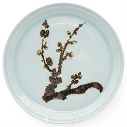Poh Chap Yeap (Chinese/British 1927-2007); celadon glazed plate and solifleur vase, the plate decorated with a branch of cherry blossom, incised signature to bases, plate D29cm, vase H11cm (2)