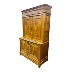 19th century French walnut dresser, the moulded cornice over two-panelled cupboard doors, enclosing two shelves and one small
drawer, on a base of two further cupboards