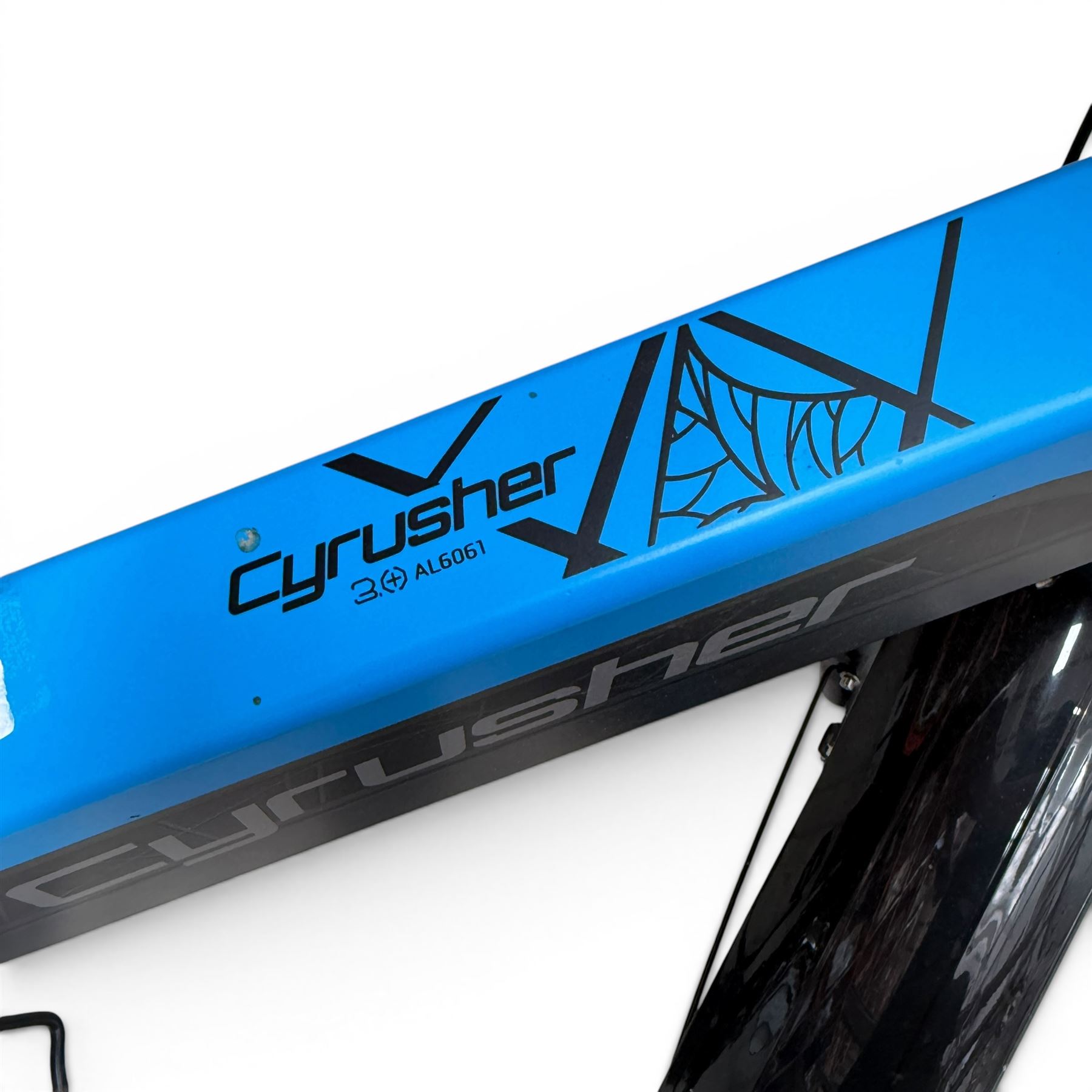 Cyrusher XF690 Plus - electric fat tyre bicycle, 250W model, with suspension forks, disc brakes, rear pannier bag and blue and black finish.