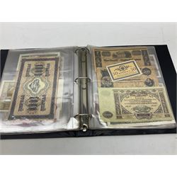 World banknotes, including Queen Elizabeth II The States of Jersey one pound 'DB202703', five pounds 'BB527762' and ten pounds 'AB651481', reserve bank of New Zealand two dollars '1L3 741894', King George V Straits Settlements one dollar 1st January 1935 'F/83 28924', various Bank of England notes etc, housed in two ring binder albums