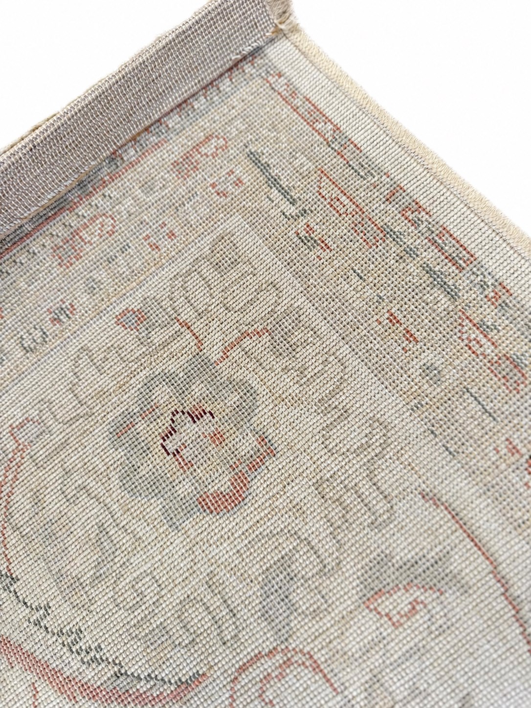 Persian design beige ground rug, patterned field