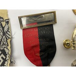 Collection of approximately sixty worldwide medals, metal badges, belt buckles, cloth badges, trench art, brass button stick etc