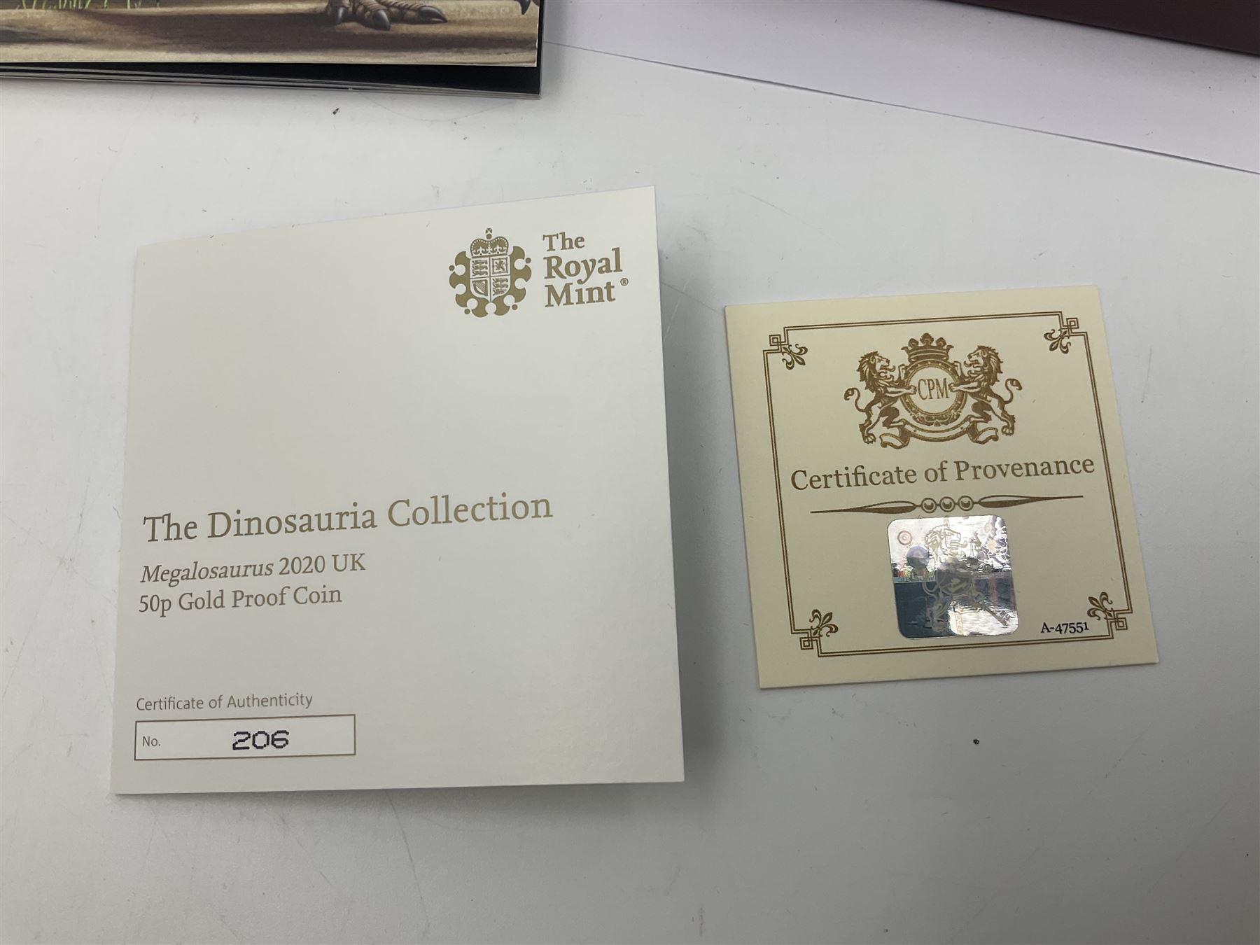 The Royal Mint United Kingdom 2020 'Tales of the Earth Megalosaurus' gold proof fifty pence coin, cased with certificate