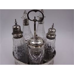 Late 18th century silver cruet stand, of oval form, with pierced sides upon four bun feet, hallmarked to handle Hester Bateman, all other hallmarks indistinct, together with five matched silver mounted cut glass cruet bottles, including some later Victorian examples, hallmarks predominantly indistinct, stand H20cm