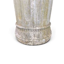 Four 20th century good quality weathered cast stone pedestal urns, circular lobed bowls with rope twist and lattice border, raised on squat base with fluted columns