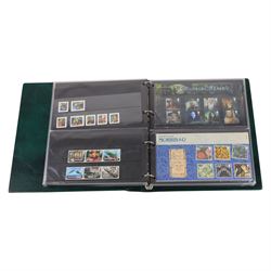 Queen Elizabeth II mint decimal stamps, mostly in presentation packs, housed in six ring binder folders, face value of usable postage approximately 750 GBP