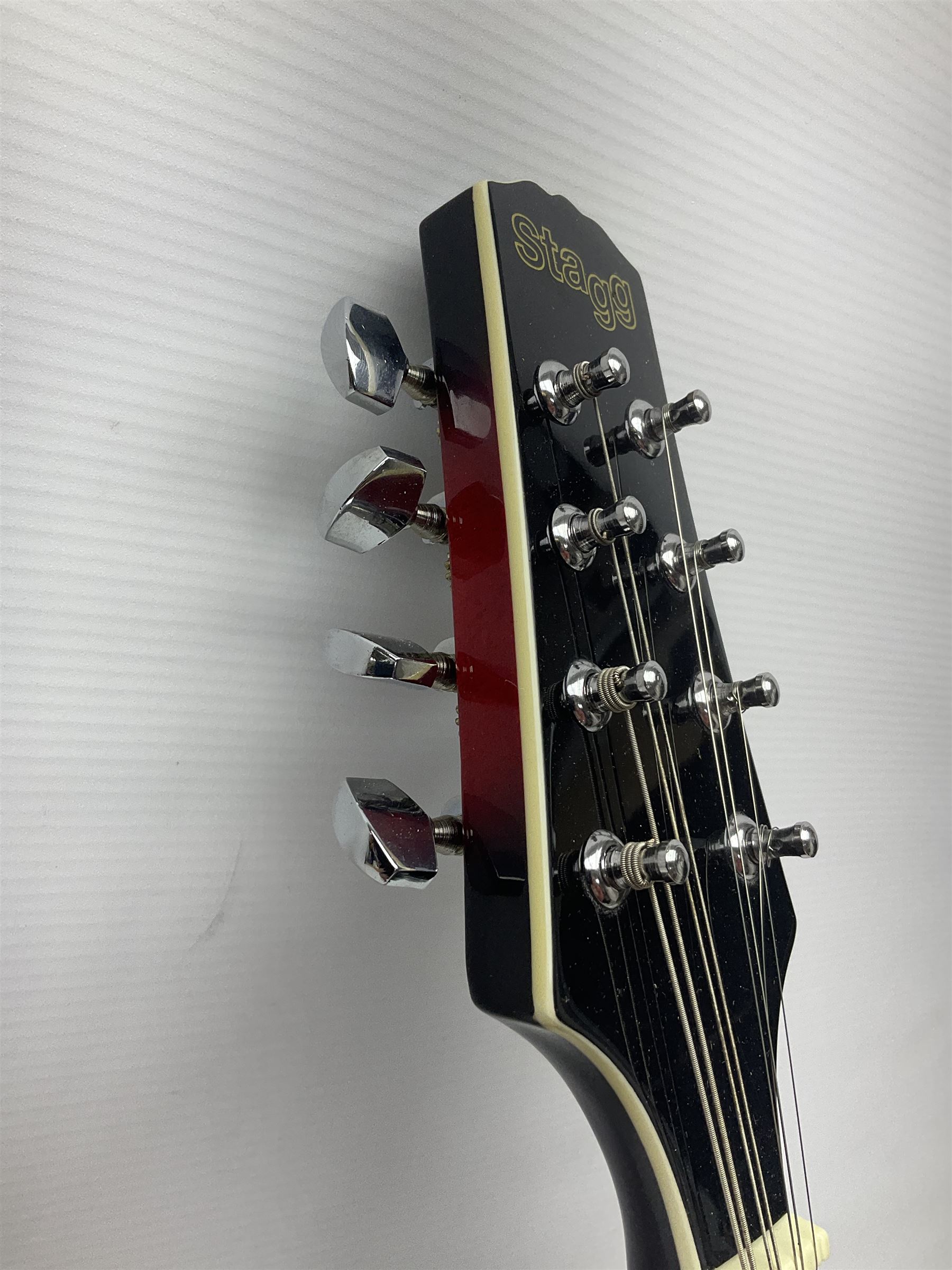 Stagg Model M50 E eight-string electro-acoustic mandolin; bears makers label L69cm; in cardboard delivery box with lead