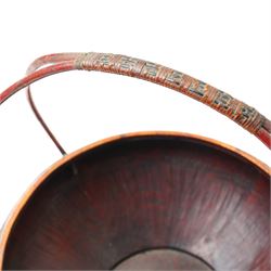 Early 20th century Chinese red lacquered marriage basket, the exterior with character and fruit motifs, H43cm; together with a red painted dowry basket, on shaped circular foot, H19cm x D35cm (2)