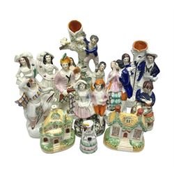  Collection of 19th century and later Staffordshire figures, including figure of a spill vases, figure groups and houses, tallest H28cm (11)