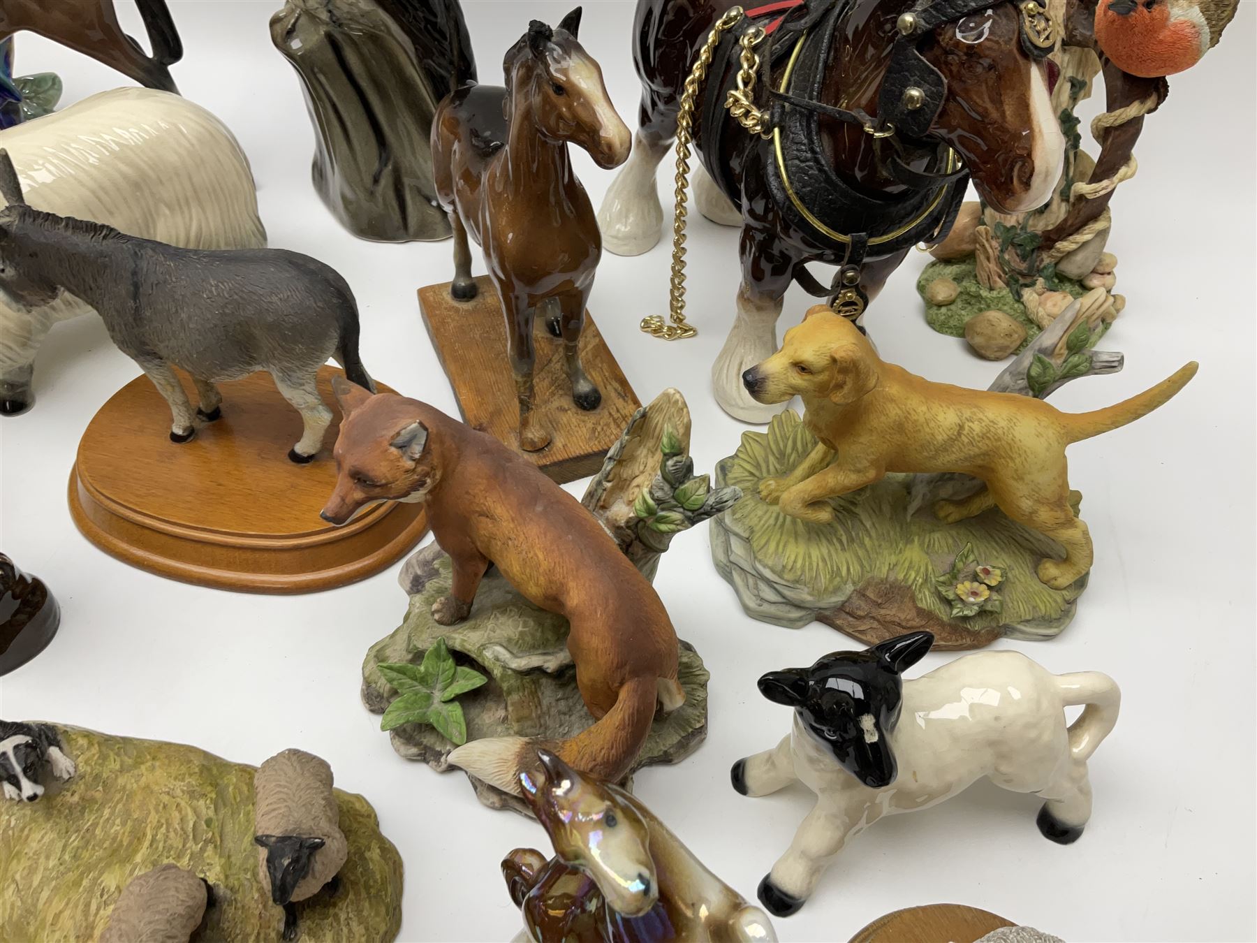 Beswick pigeon no 1383 and a collection of other ceramic animal figures including Campsie Ware lustre budgies, Kowa red fox and Labrador, two shire ponies, two sheep, etc 