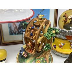 Collection of Disney figures, to include Ardleigh Elliott music box Hunny of the Day, Disney musical snow globe, Micky mouse lazy butler, Framed Bug's Life lithograph etc 