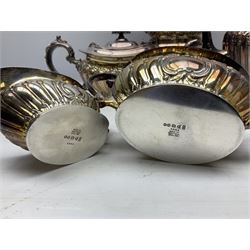 Early 20th century silver plate five piece tea and coffee service comprising teapot, coffee pot, sugar bowl, cream jug and spirit kettle, each of baluster form with double-C scroll handle and scroll and foliate detail, the coffee pot H20cm