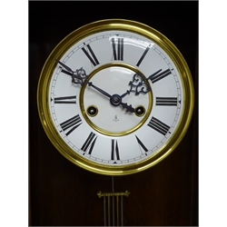  Late 19th century walnut Vienna style wall clock, shaped pediment, brass and enamel dial with Roman numerals and Gustav Becker monogram and eight day movement striking on a gong, H107cm  