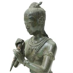 Early 20th century South East Asia bronze figure seated in the lotus position holding a dagger H28cm 