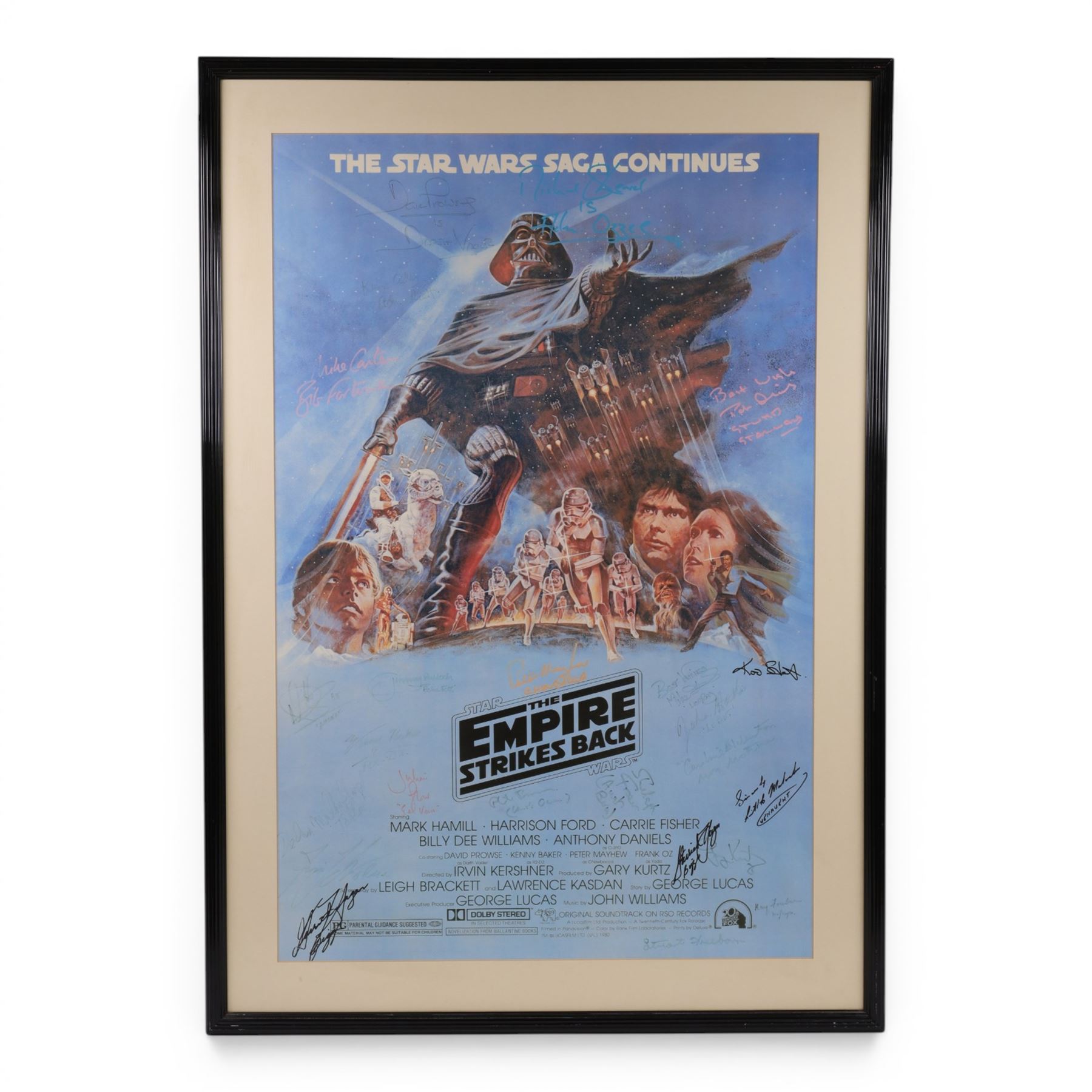 Autographed 1980s Star Wars Empire Strikes Back movie poster, with artwork by Tom Jung, with signatures including Michael Sheard (Admiral Ozzel), Koo Stark, Caroline Blakiston (Mon Mothma), Shelagh Fraser (Aunt Beru), Mike Edmonds (Logray), Peter Mayhew (Chewbacca), Jeremy Bulloch (Boba Fett), Stuart Freeborn (Creature Designer), Warwick Davies (Wicket), Michael Carter (Bib Fortuna), Dave Prowse (Darth Vader), Kenny Baker (R2D2), signatures and poster obtained at the Dave Prowse Promotions Mulitcon Event 1998 at The Norbreck Caste Hotel, Blackpool, in glazed black frame, frame H115cm