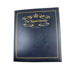 Commemorative coin and stamps covers, including Australia 'Queen's Birthday 1996' containing one dollar coin, Canada 'Her Majesty Queen Elizabeth II 70th Birthday' containing five dollars coin, various commemorative crown coin stamp covers etc, housed in 'The Royal Family' ring binder folder