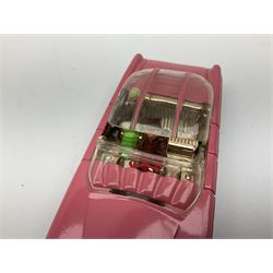 Dinky - Lady Penelope's FAB1 No.100,  in pink with clear sliding roof with pink stripes, Lady Penelope and Parker figures, four plastic harpoons plus red and white missile and flying lady mascot to radiator; boxed with inner card stand