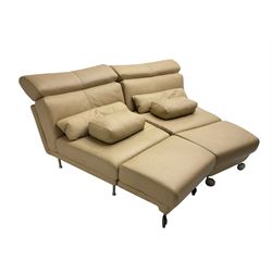 Natuzzi - Italian modular two seat sofa, the two triangular sections with adjustable head rests and interconnected swing end foot stools, upholstered in beige leather, with matching loose cushions