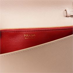 Prada - Saffiano Leather Mini Crossbody Bag, in structured nude-pink leather with detachable gold-tone chain shoulder or crossbody strap and hardware, Prada Milano raised logo, with crimson leather interior, unused with original dust bag