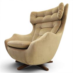 Parker Knoll - 'Blofeld' type model 1028 Statesman swivel chair, upholstered in grey velvet fabric, raised on a teak five point base  