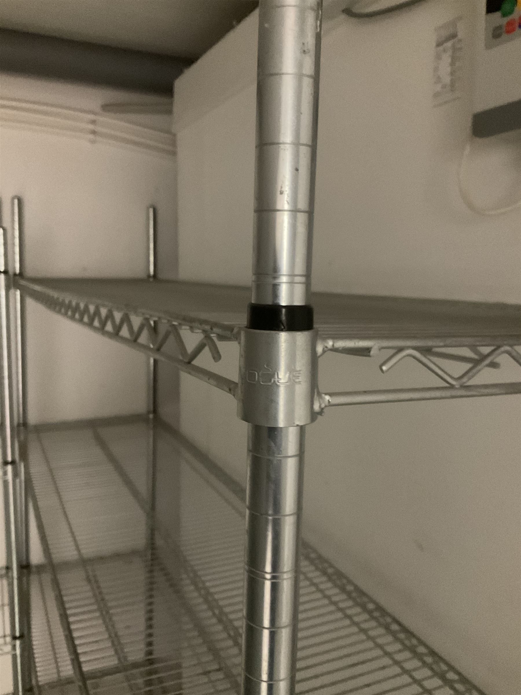 Metal four tier shelving racking x 3, plastic racking and shelving- LOT SUBJECT TO VAT ON THE HAMMER PRICE - To be collected by appointment from The Ambassador Hotel, 36-38 Esplanade, Scarborough YO11 2AY. ALL GOODS MUST BE REMOVED BY WEDNESDAY 15TH JUNE.