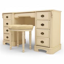 Contemporary French design white painted bedroom suite retailed by Barkers of Northallerton, comprising wide chest fitted with four short and four long drawers with oval brass handles (H 70cm, W 159cm, D 46cm), pair of bedside chests each fitted with three drawers (H 62cm, W 40cm, D 46cm), dressing table fitted with four short drawers and central kneehole with shaped apron (H 79cm, W 131cm, D 46cm) with matching framed wall mounted mirror (H 100cm, W 113cm), and full length standing mirror (H 175cm, W 73cm)